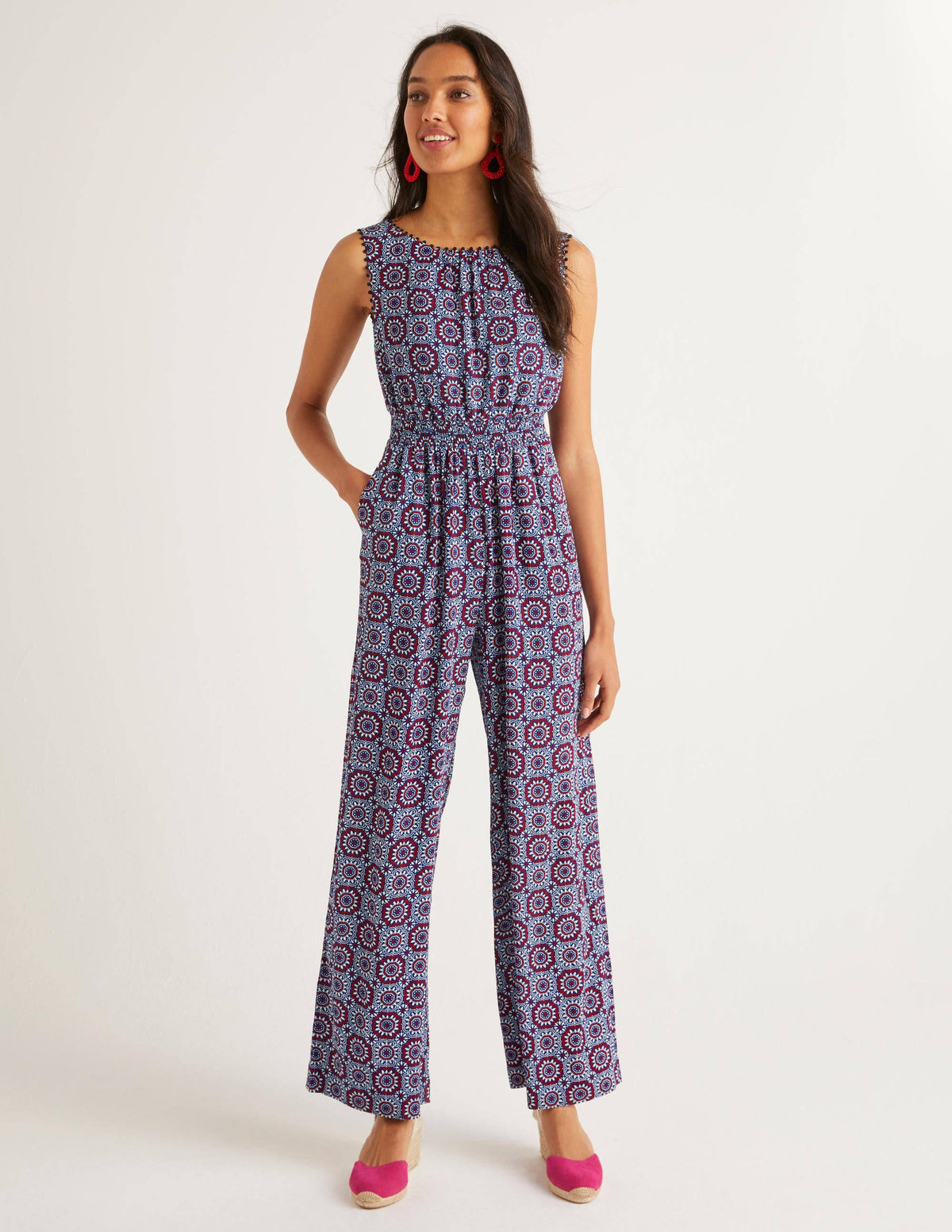 Elisa Jumpsuit mit Bommelborte-Kräftiges Blau, Sonnenmuster - Image 1