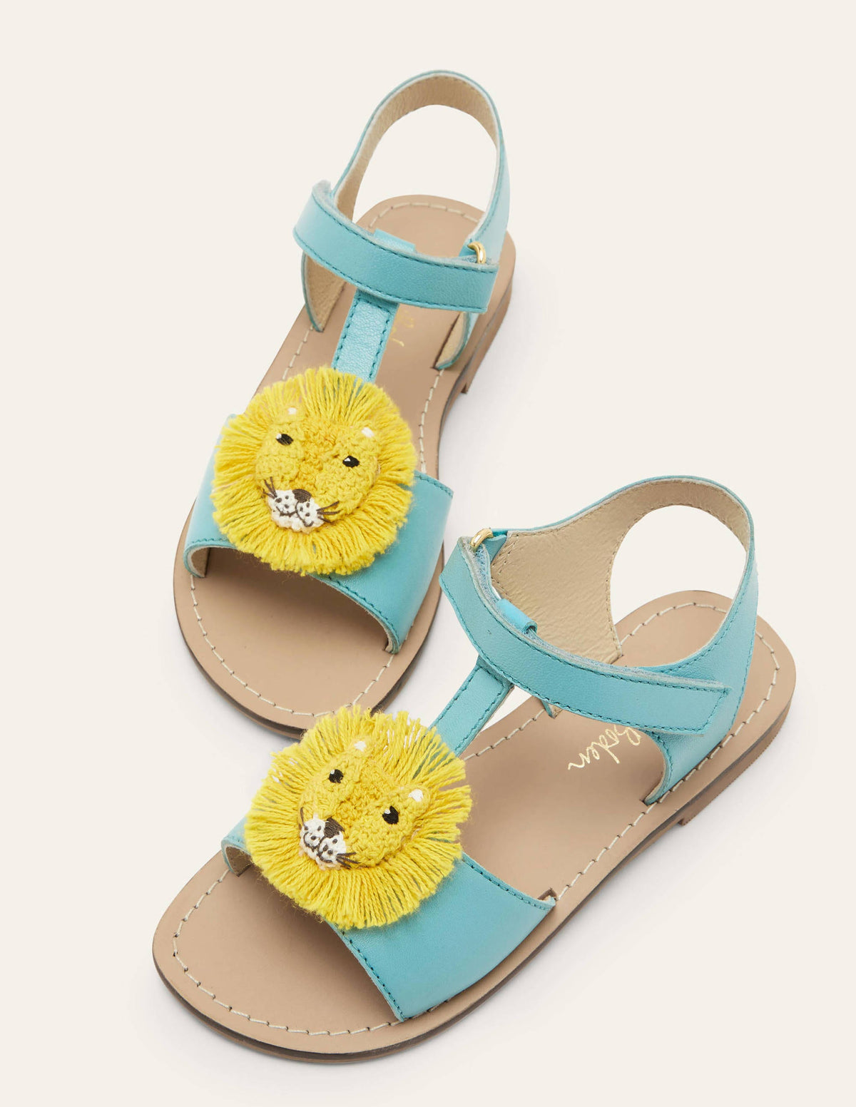 Fröhliche Ledersandalen-Löwe-1
