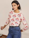 Flauschiger Pullover mit Muster-Naturweiß, Blühende Knospen