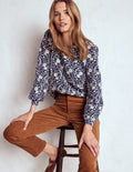 Schmal geschnittene Cord-Jeans mit hohem Bund-Ingwer