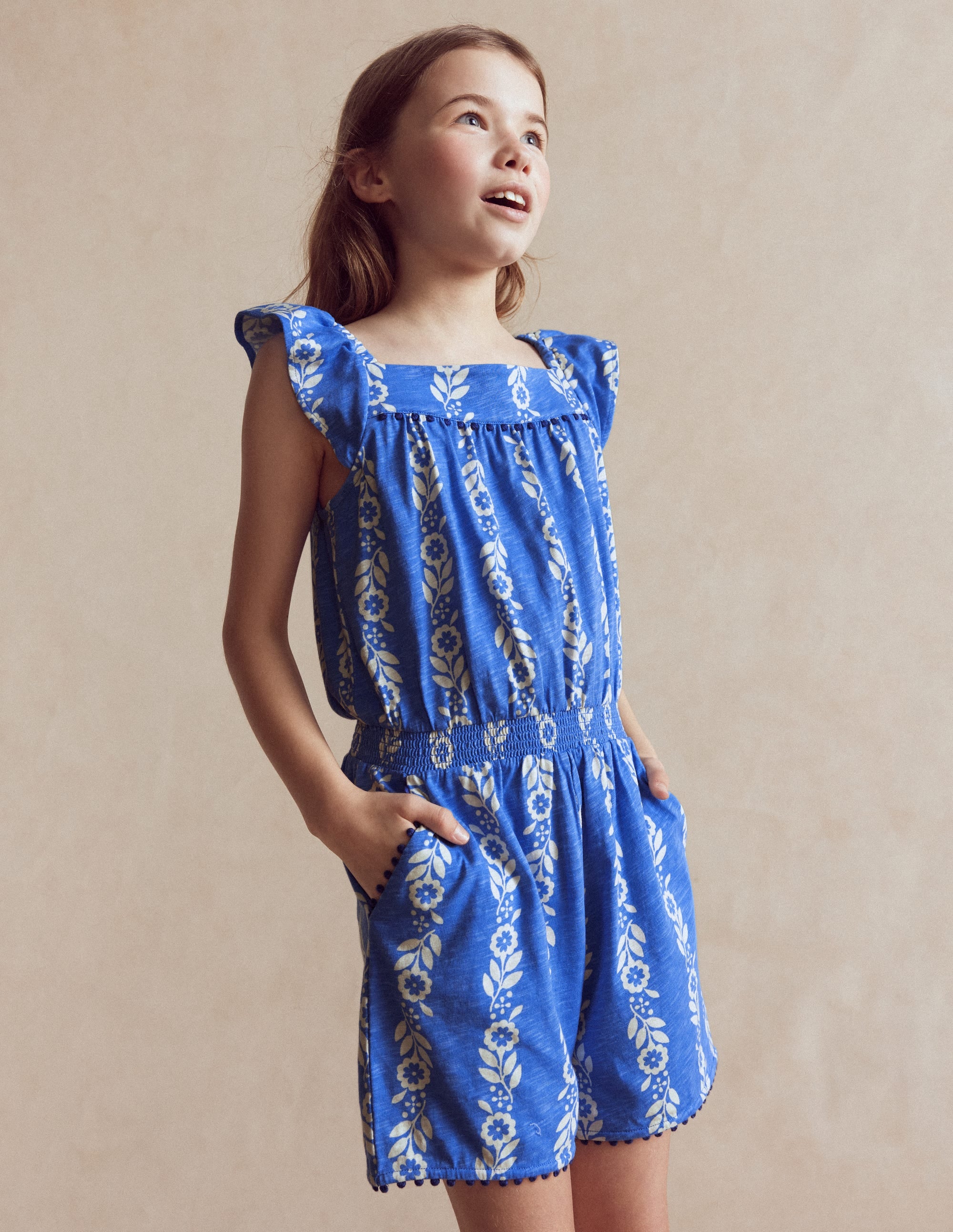Ciara Jersey-Spielanzug mit Bommelbesatz-Blau Geblümt - Image 1