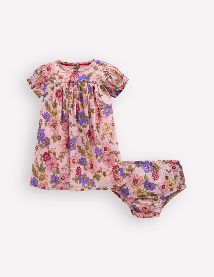 Gerafftes, gewebtes Kleid-Mittelrosa Blumenmuster