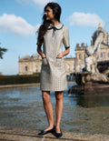 Robe droite à poches et nœud-Jacquard doré