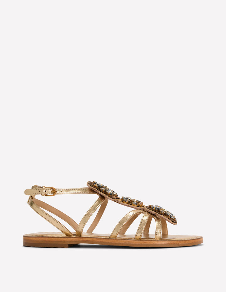Flache Sandalen mit Schmucksteinen-Gold